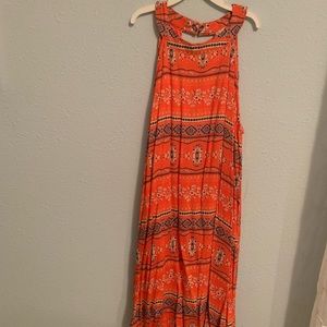 Never been worn. This dress is super cute but never had the opportunity to wear